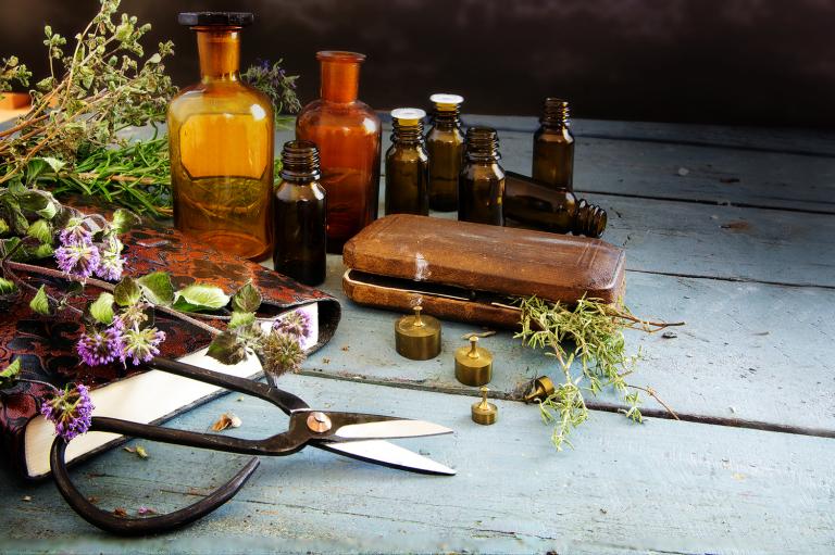 Bitter herbs, scissors and apothecary bottles